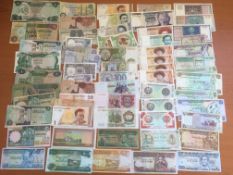 A PACKET OF BANKNOTES IN MIXED GRADES, LIBYA, EGYPT, RUSSIAN REPUBLICS, SYRIA, ETHIOPIA (APPROX 60).