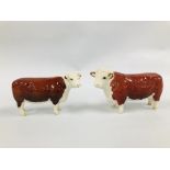 A BESWICK HEREFORD COW AND A BESWICK HEREFORD BULL CH OF CHAMPIONS