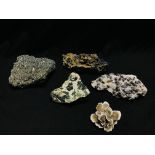 A COLLECTION OF APPROX 5 CRYSTAL AND MINERAL ROCK EXAMPLES.