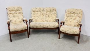 A PARKER KNOLL STYLE THREE PIECE SUITE COMPRISING OF TWO ARMCHAIRS AND A TWO SEATER SOFA,