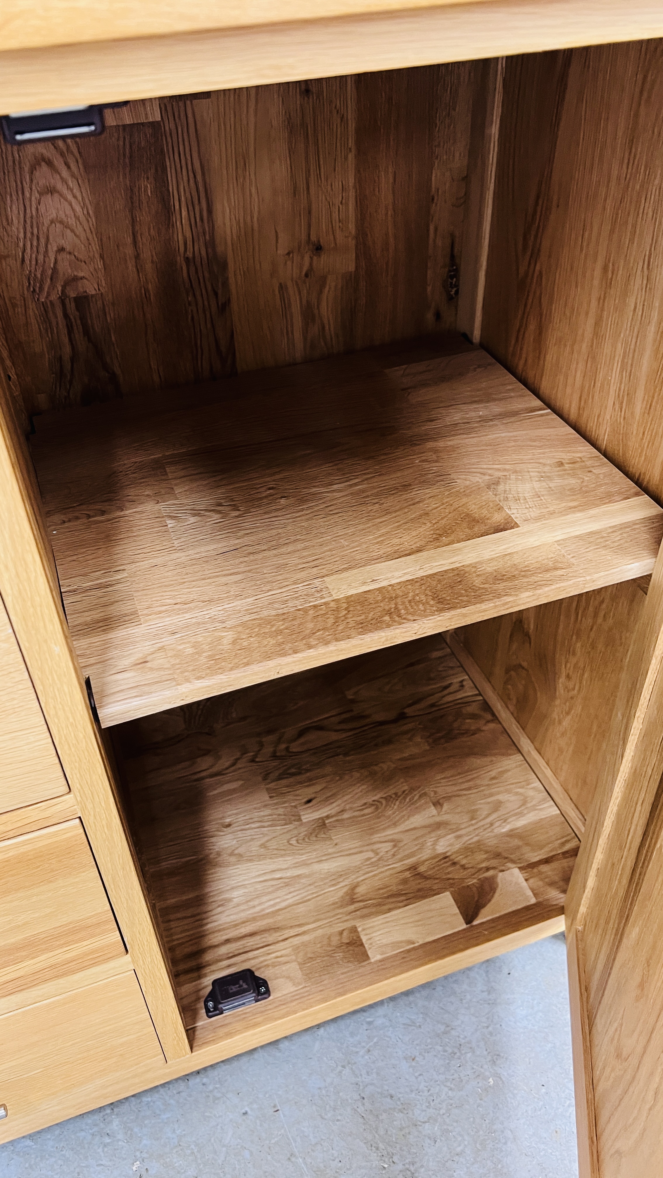 MODERN SOLID LIGHT OAK SIDEBOARD THREE CENTRAL DRAWERS FLANKED BY TWO CUPBOARD DOORS, W 131CM, - Image 10 of 14