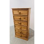 WAXED PINE SIX DRAWER TOWER CHEST HEIGHT 106CM. WIDTH 52CM. DEPTH 32CM.