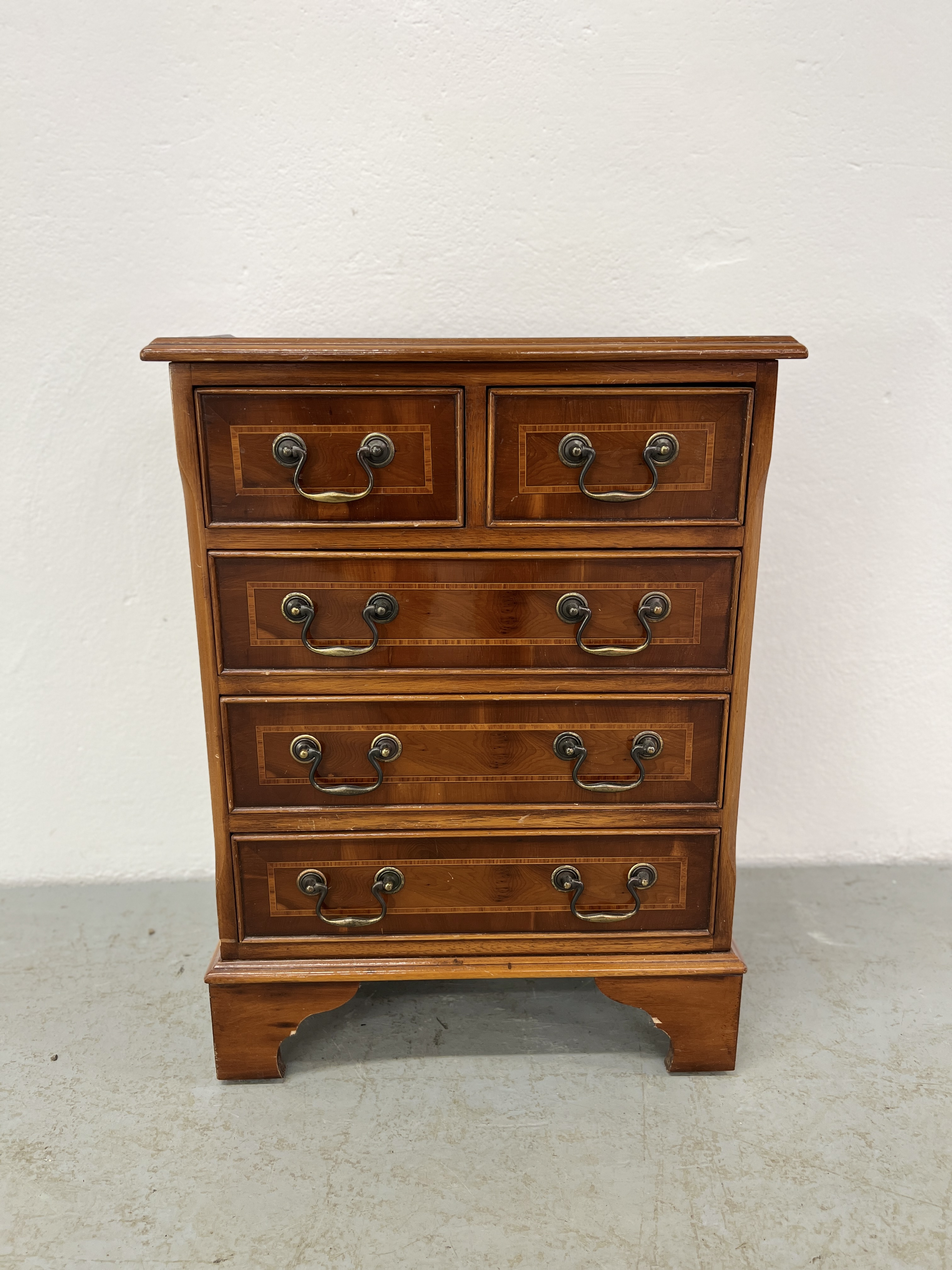 REPRODUCTION MINIATURE TWO OVER THREE DRAWER CHEST WITH INLAID BANDING WIDTH 46.5CM. DEPTH 32.5CM.