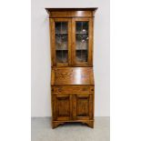 AN OAK ARTS AND CRAFTS STYLE BUREAU BOOKCASE WITH GLAZED STAINGLASS DOORS