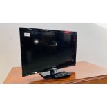A PANASONIC 24 INCH TELEVISION COMPLETE WITH REMOTE CONTROL - SOLD AS SEEN