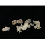 A COLLECTION OF APPROX 7 CRYSTAL AND MINERAL ROCK EXAMPLES TO INCLUDE QUARTZ ETC.