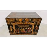 AN ANTIQUE JAPANESE CAMPHOR WOOD THEATRICAL COSTUME TRUNK THE FRONT PANEL DECORATED WITH FIGURES