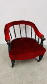 VICTORIAN EBONISED TUB CHAIR WITH TURNED SUPPORTS UPHOLSTERED IN RED VELVET