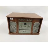 AN AKWA VINTAGE STYLE RECORD/CD/RADIO PLAYER - SOLD AS SEEN