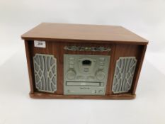 AN AKWA VINTAGE STYLE RECORD/CD/RADIO PLAYER - SOLD AS SEEN
