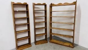 THREE WAXED PINE SEVEN TIER OPEN BACK SHELVES TO INCLUDE 2 X WIDTH 55CM. HEIGHT 176CM.