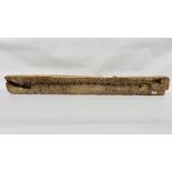 AN ANTIQUE HEAVILY CARVED HARDWOOD TIMBER BEAM WITH ISLAMIC RELIGIOUS INSCRIPTION LENGTH `34CM.
