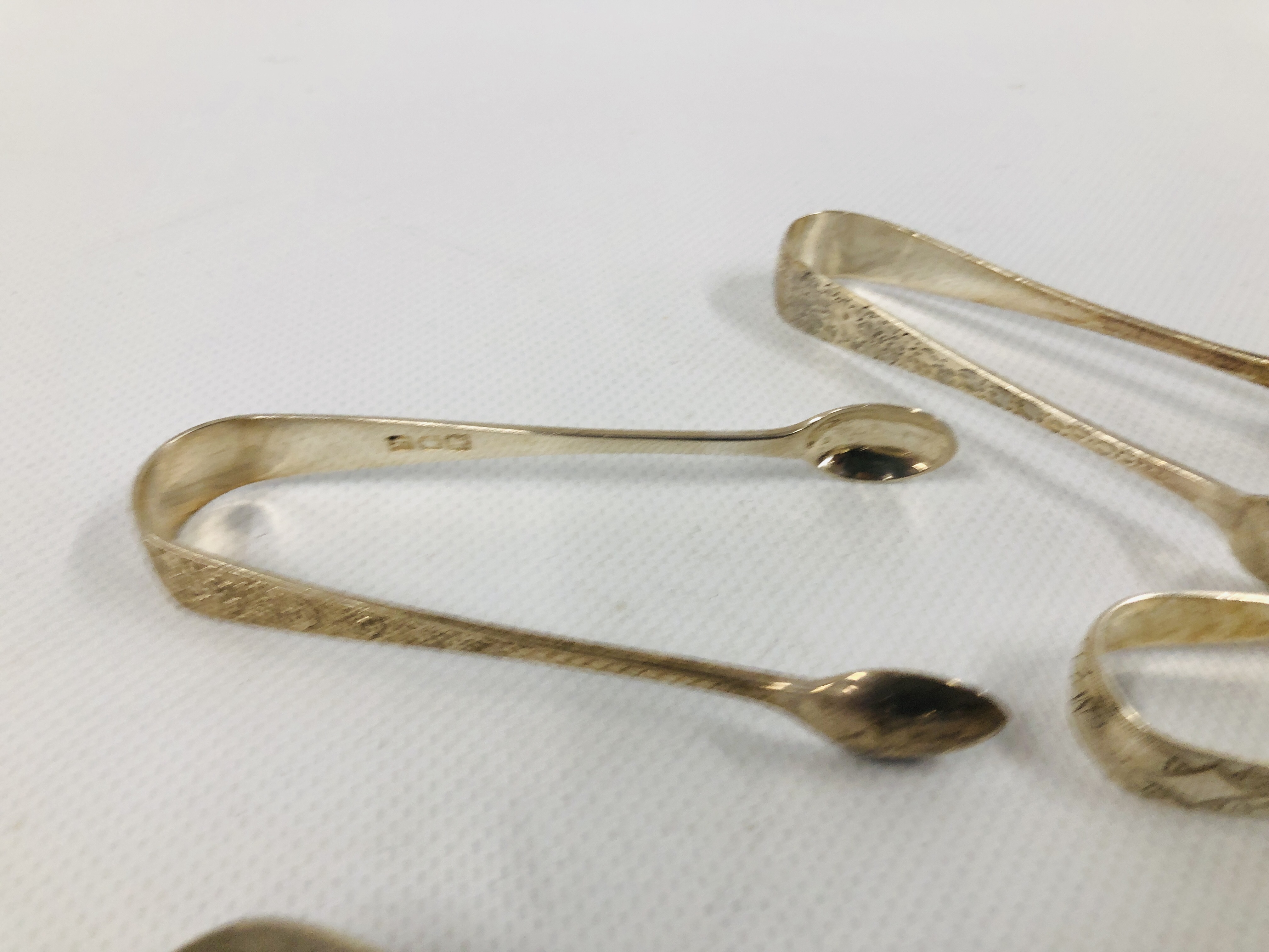 GROUP OF 8 VARIOUS SILVER SUGAR NIPS, VARIOUS MAKERS AND ASSAYS. - Image 4 of 7