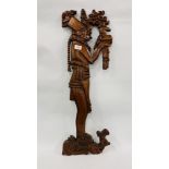 AN ETHNIC "HONDURAS" HARDWOOD WALL CARVING OF A STANDING FIGURE HEIGHT 84CM.