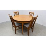 MODERN DINING SET COMPRISING FOUR BEECHWOOD CHAIRS AND EXTENDING CIRCULAR DINING TABLE.