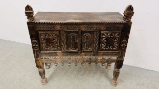 AN EASTERN HARDWOOD HAND CARVED DOWRY CHEST/CUPBOARD WIDTH 89CM. DEPTH 33CM. HEIGHT 91CM.