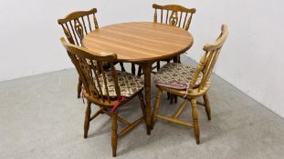 MODERN CIRCULAR DINING TABLE ALONG WITH A SET OF FOUR DINING CHAIRS BY "H.J.