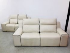 A PAIR OF CREAM LEATHER DESIGNER TWO SEATER SOFAS EACH HAVING ONE ELECTRIC RECLINING FUNCTION -