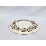 A CIRCULAR WHITE MARBLE PLATTER THE BORDER INLAID WITH A GARLAND OF POLISHED STONE AND MOTHER OF