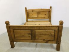 A MEXICAN PINE DOUBLE BEDSTEAD