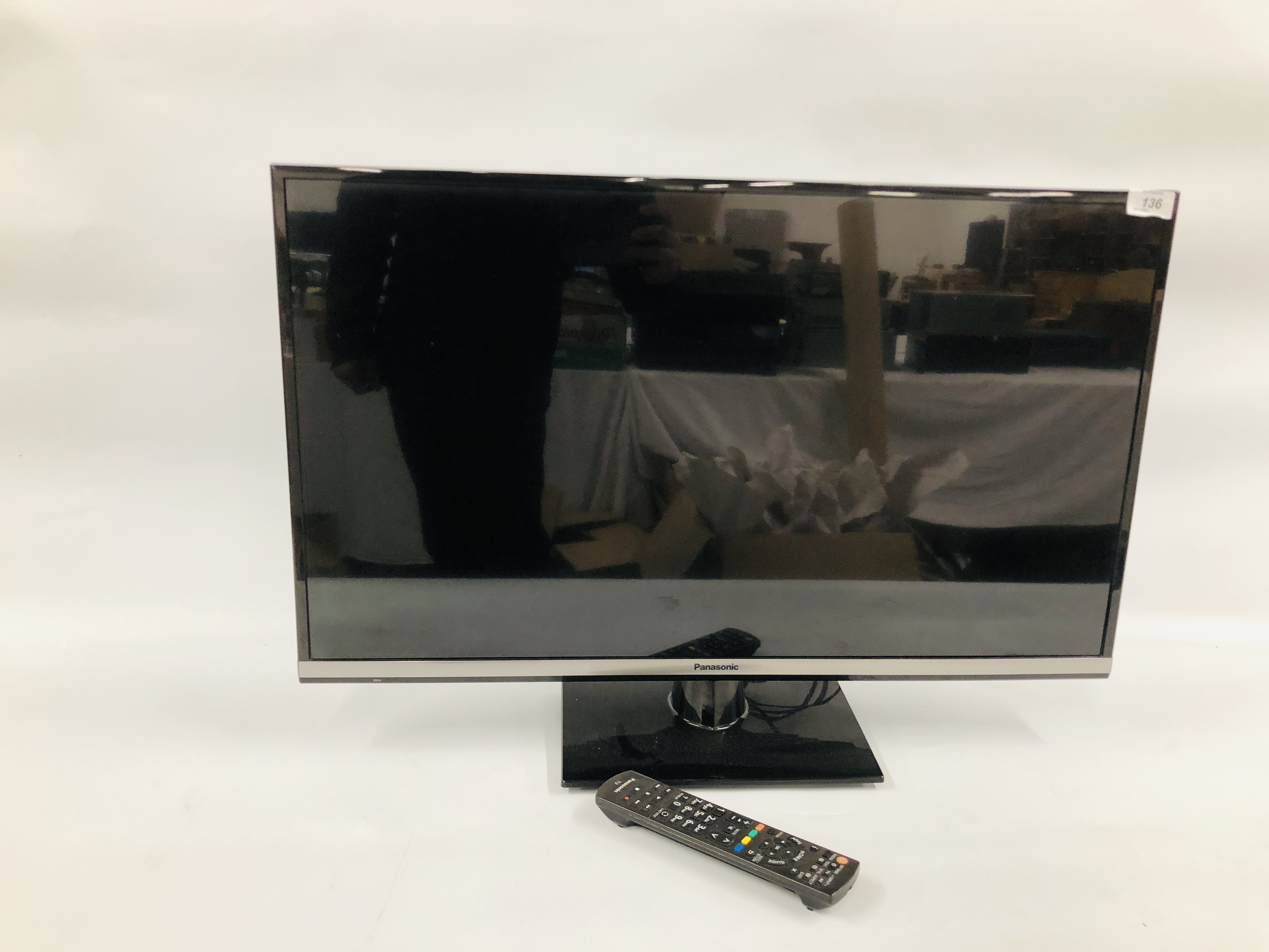 PANASONIC 32 INCH LCD TELEVISION MODEL TX-32AS600B ON A MODERN THREE TIER BLACK GLASS STAND - SOLD