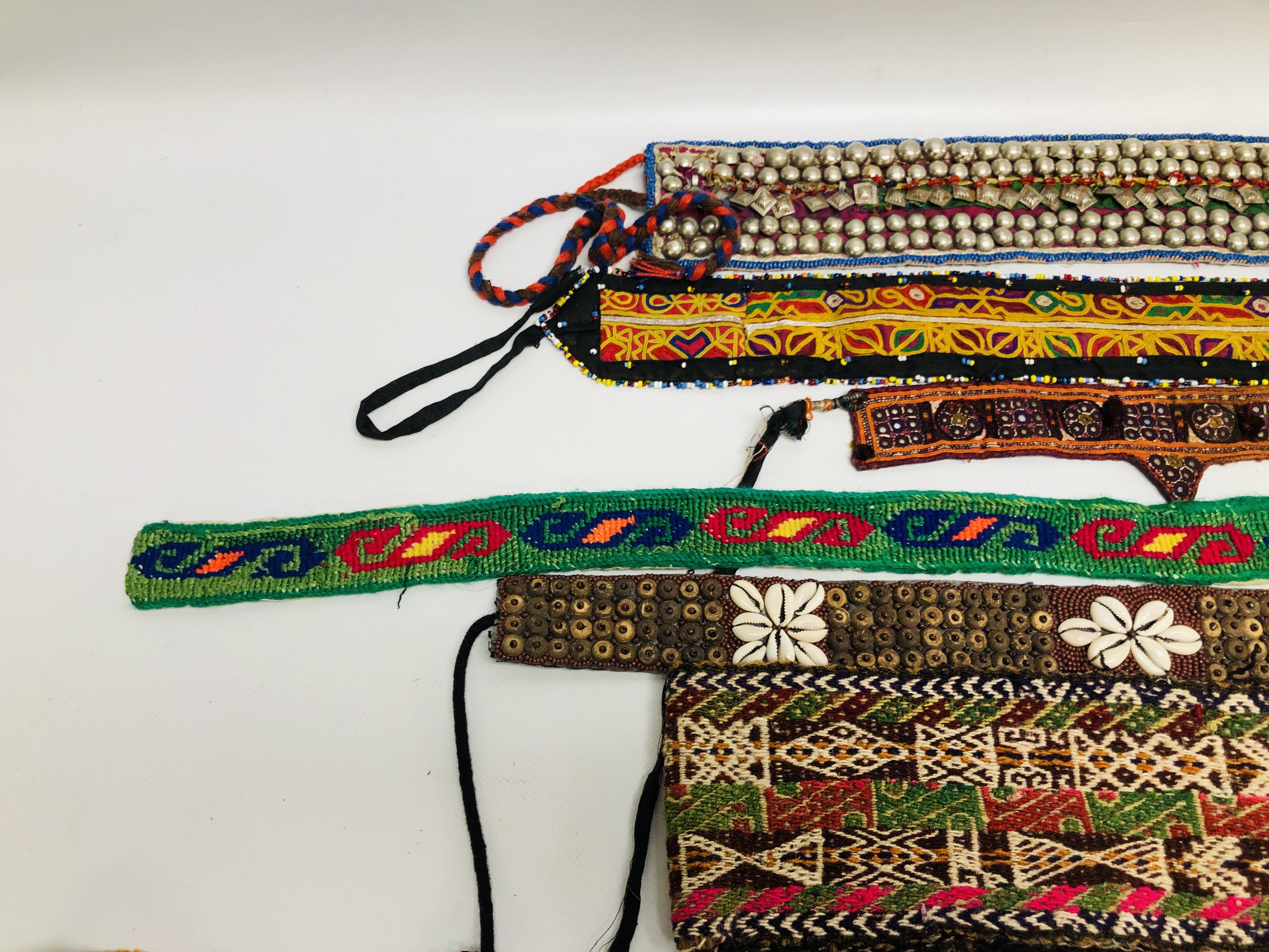 BOX OF EASTERN AND ASIAN TRIBAL ART BELTS AND PANELS TO INCLUDE EMBROIDERED, - Image 4 of 6