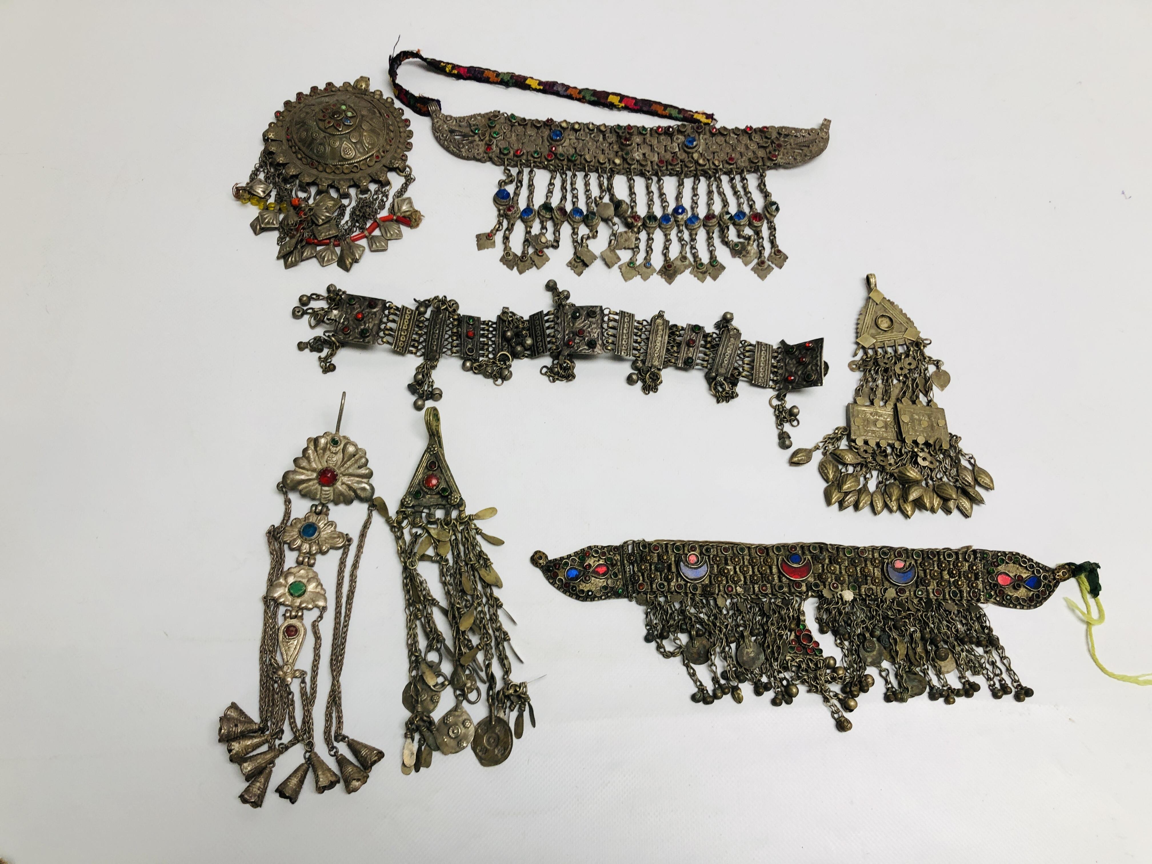 A GROUP OF ASSORTED EASTERN STYLE WHITE METAL JEWELLERY AND GARMENT / HEAD ACCESSORIES,