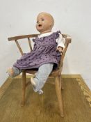 BEECHWOOD CHILD'S CHAIR AND VINTAGE COMPOSITE DOLL.