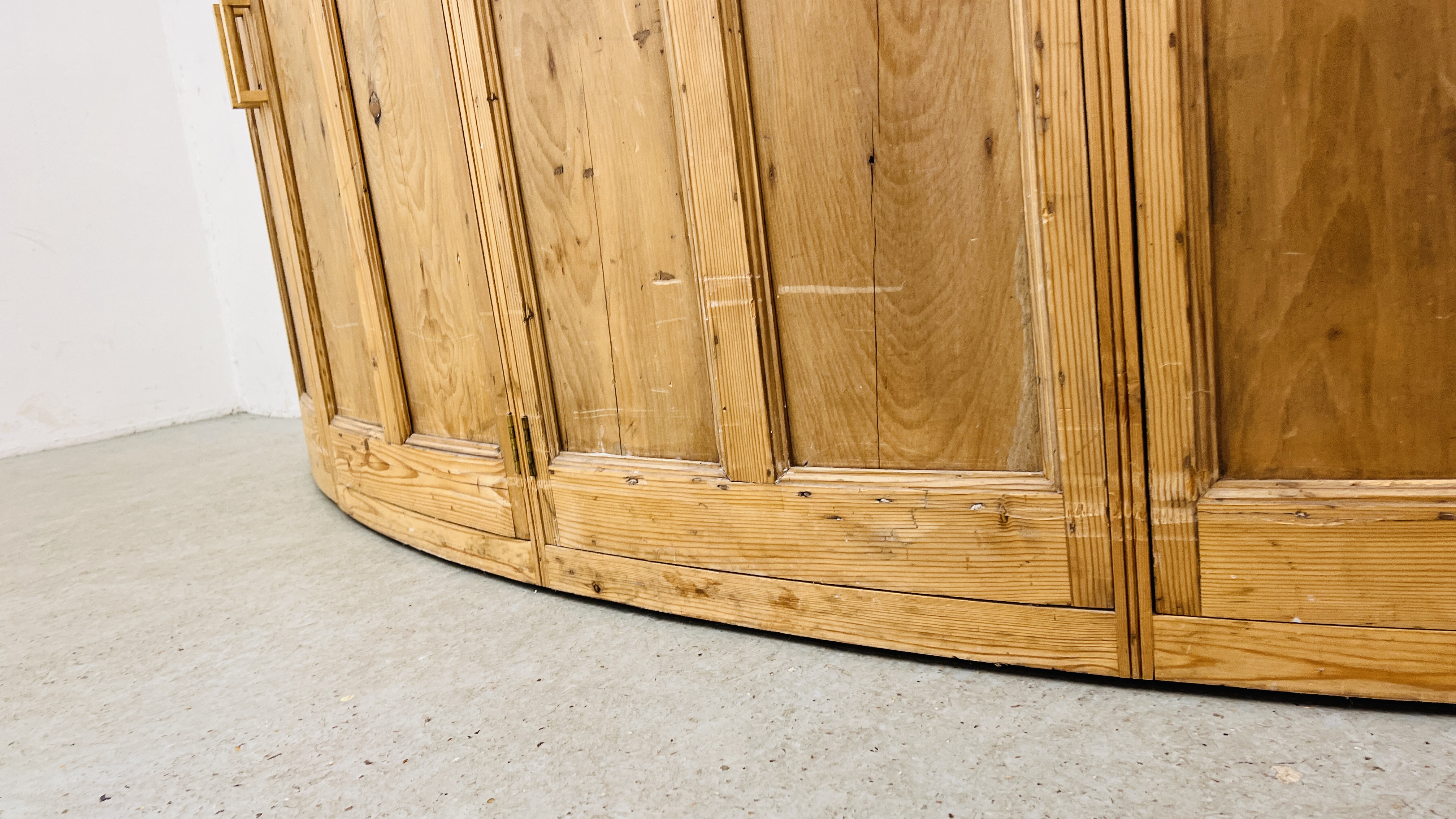 A LARGE SOLID PINE BOW FRONTED 4 DOOR SIDE CABINET W 246CM. X D 61CM. X H 96CM. - Image 7 of 11