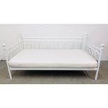 A MODERN METAL FRAMED DAY BED