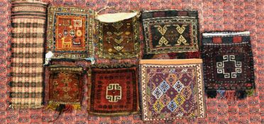 A GROUP OF EIGHT BAGS TO INCLUDE PERSIAN AND AFGHAN EXAMPLES (PERSIAN BAG 43 X 35CM.