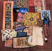 A BOX OF ASSORTED EASTERN AND PERSIAN STYLE HAND CRAFTED NEEDLEWORK AND EMBROIDERY PANELS AND