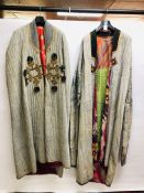 A TRADITIONAL HANDCRAFTED ETHNIC ROBE, STRIPED MATERIAL WITH APPLIED WOVEN AND TASSEL DECORATION,