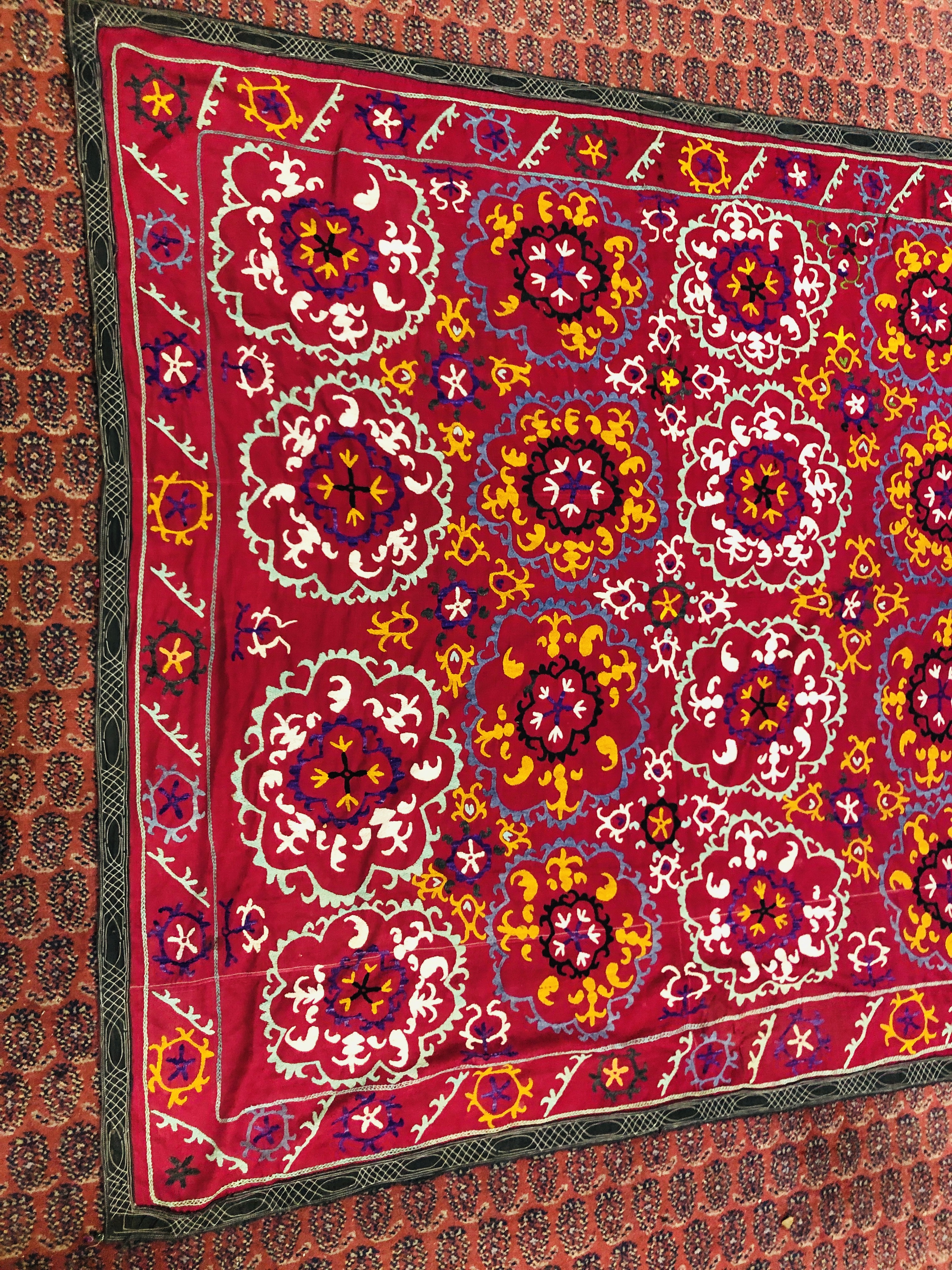 A SUZANI EMBROIDERED ON A PLUM FIELD, 180CM X 171CM. - Image 2 of 8