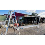 A PAIR OF YOUNGMAN ALUMINIUM 8FT FOLDING TRESTLE STANDS AND YOUNGMAN 12FT SUPERBOARD WORK PLATFORM.