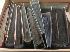 BOX OF OLD CORNER SLOT POSTCARD ALBUMS, ONE WELL FILLED, OTHERS MAINLY EMPTY.