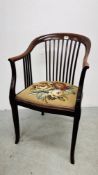 AN ANTIQUE MAHOGANY STRUNG BACK AND TAPESTRY SEAT.