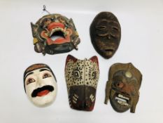 A GROUP OF 5 CULTURAL HANDCRAFTED WALL / FACE MASKS TO INCLUDE FOLK ART ETC.