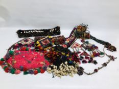 A GROUP OF ETHNIC TRIBAL EMBROIDERY AND HANDCRAFTED TEXTILES TO INCLUDE CHILDRENS TOYS AND HANGING