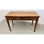 A MAHOGANY TWO DRAWER WRITING TABLE STANDING ON SQUARE TAPERED LEG W 115CM. D 53CM. H 75CM.