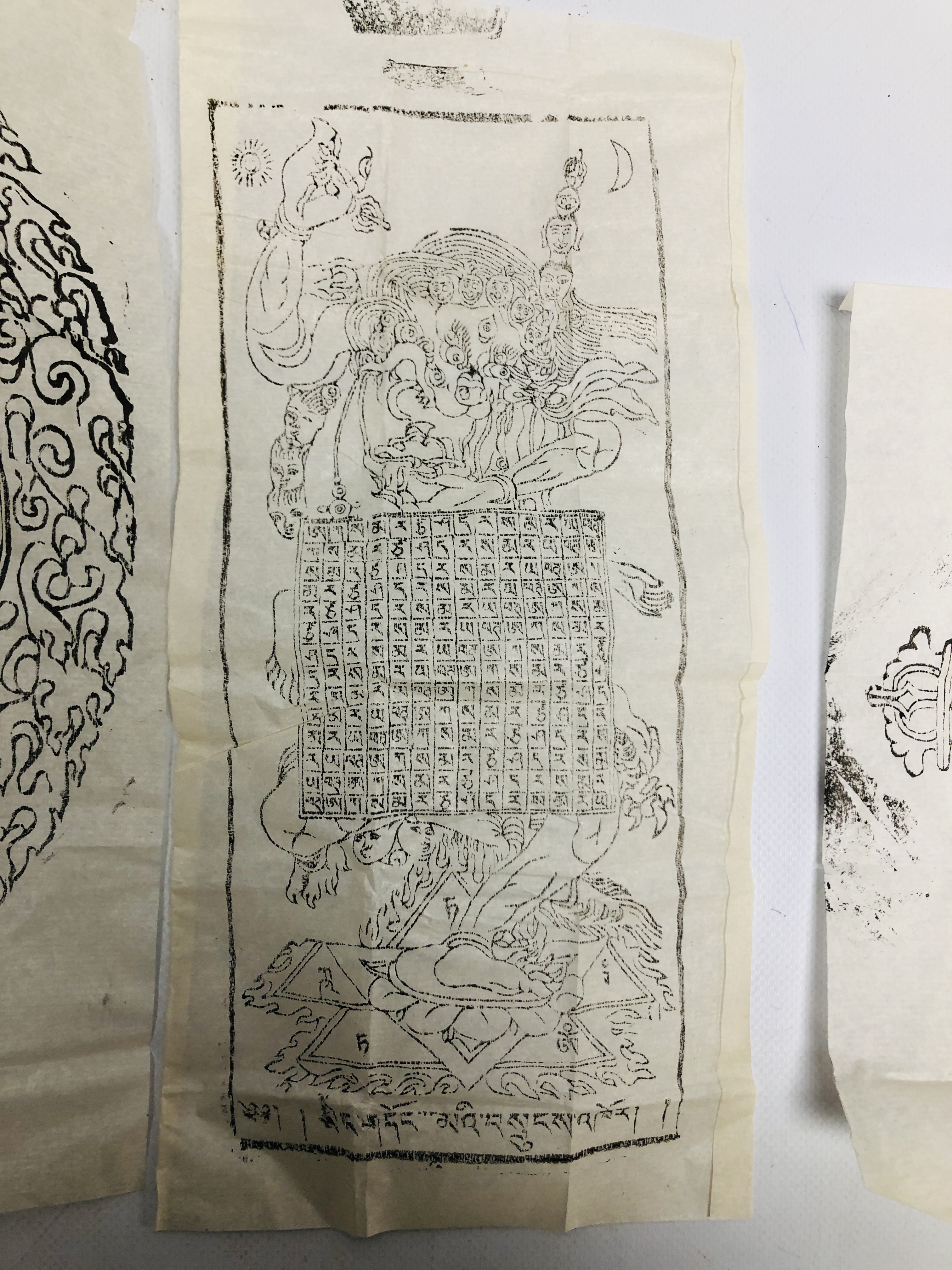 A GROUP OF THREE TIBETAN BUDDHIST INK DRAWINGS ON RICE PAPER, TWO OF INSCRIBED WHEEL DESIGN, - Bild 4 aus 7