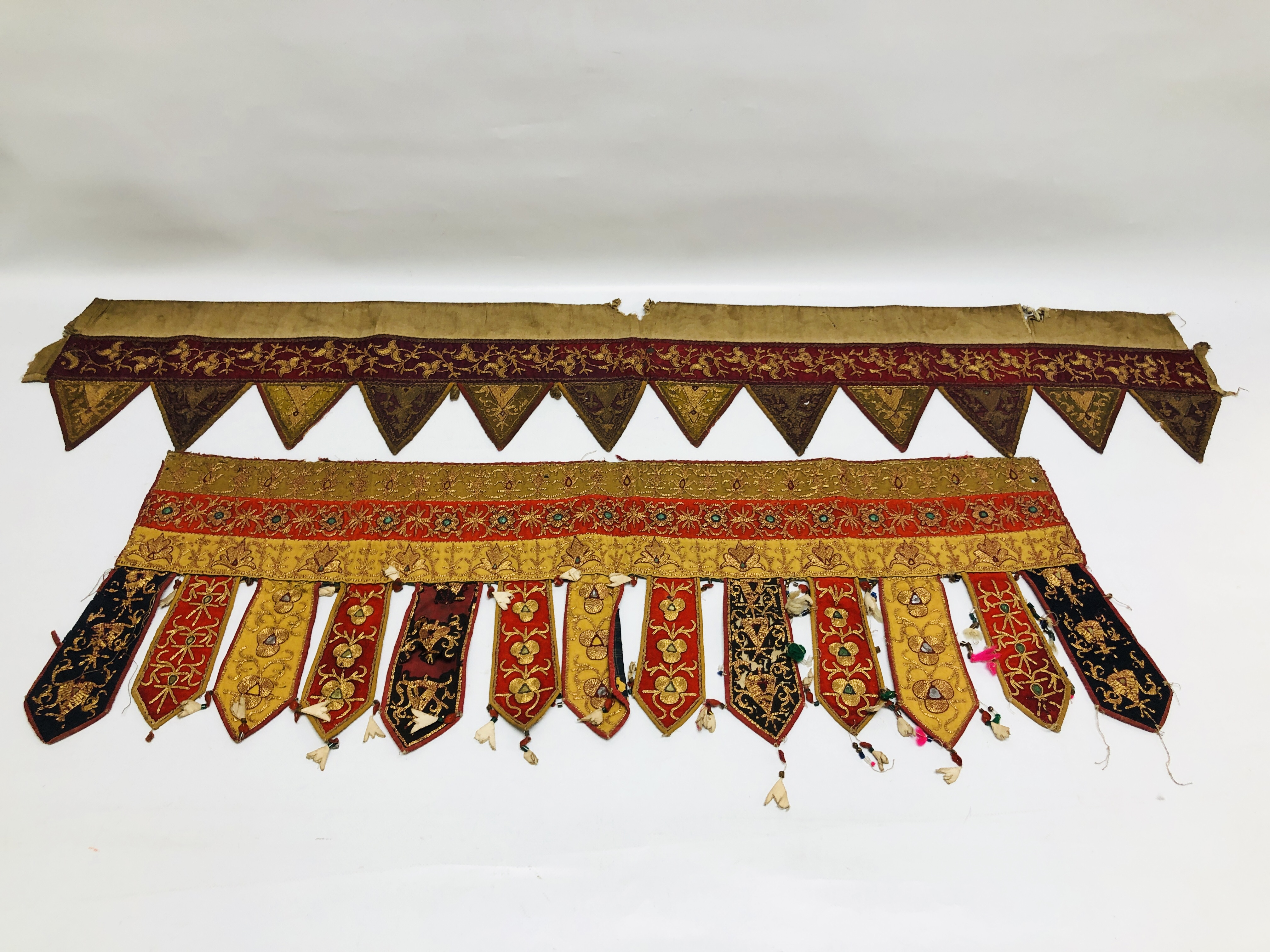 TWO AFGHAN EMBROIDERED DOOR HANGINGS WORKED WITH GOLD THREAD, 122CM AND 84CM.