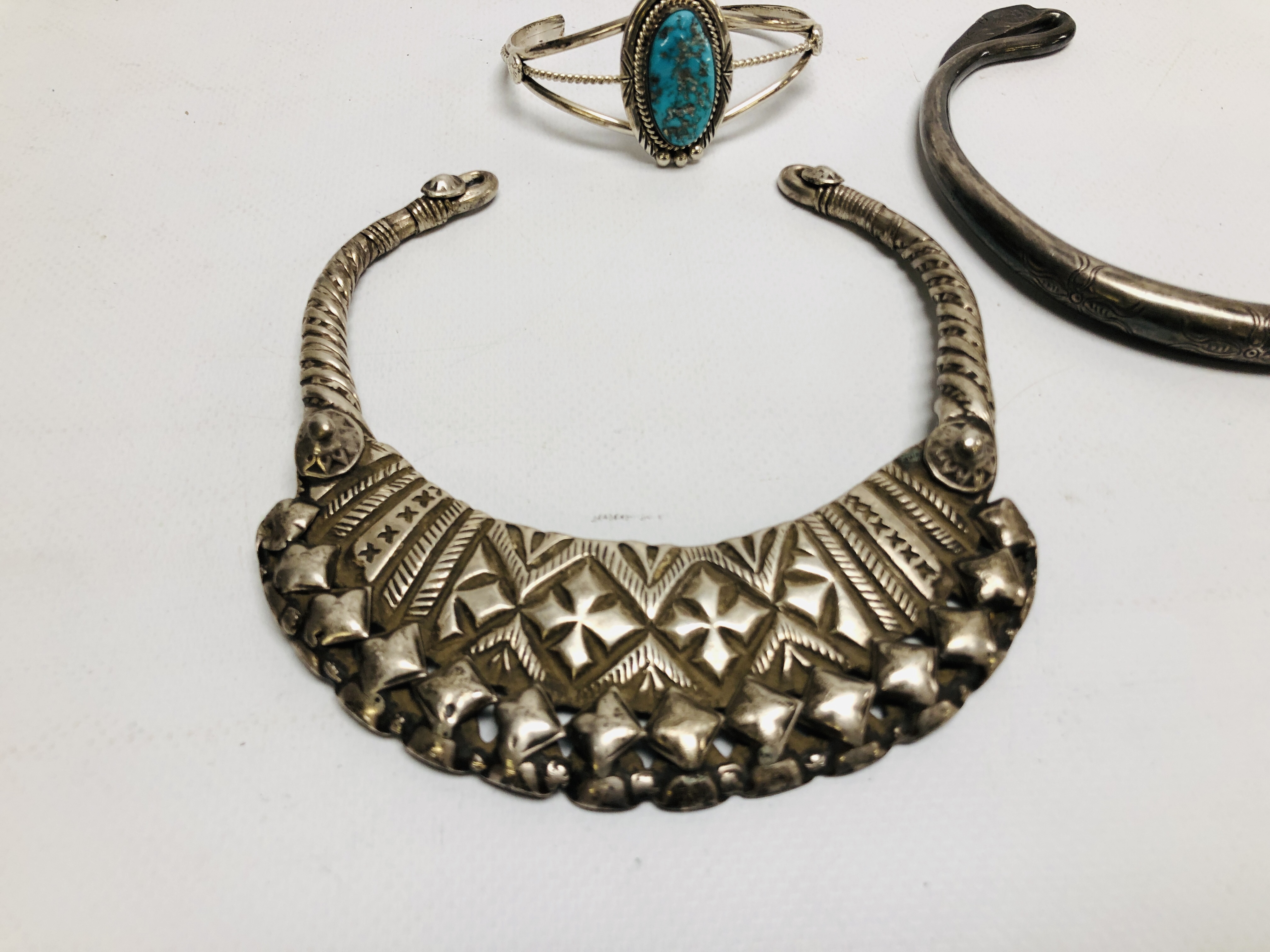 TWO EASTERN TRIBAL STYLE WHITE METAL CUFF / CHOKER NECKLACES OF VARIOUS DESIGNS. - Image 2 of 8