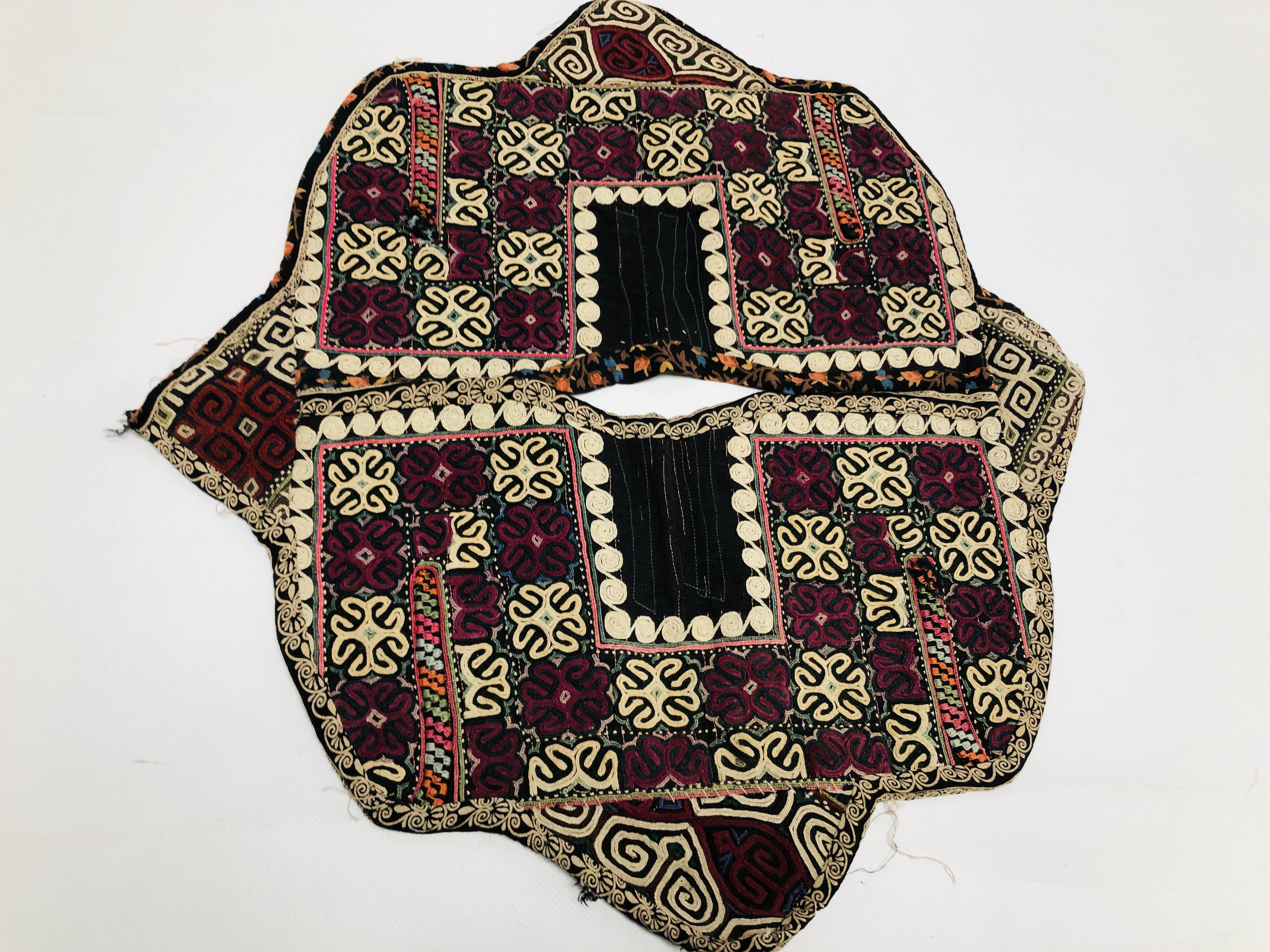 A GROUP OF 5 ASIAN TRIBAL TEXTILE GARMENTS TO INCLUDE SUZANI EXAMPLES. - Image 9 of 9