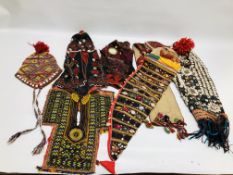 A GROUP OF 5 ETHNIC AND TRIBAL HATS / HEAD COVERINGS TO INCLUDE AN ELABORATELY EMBROIDERED ASIAN