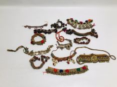 A GROUP OF 13 AFGHAN ANKLE BRACELETS MID C20TH,