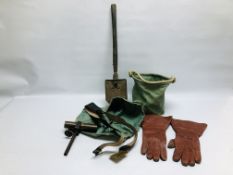 A GROUP OF MILITARY COLLECTIBLES TO INCLUDE A GUN SIGHT, SPADE AND A CANVAS SHELL CARRIER,