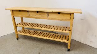 A MODERN SOLID BEECH WOOD 3 DRAWER WORK STATION WITH SLATTED SHELVES BELOW L 188CM. X D 41CM.