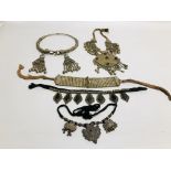 A GROUP OF 5 ELABORATE EASTERN STYLE WHITE METAL NECKLACES TO INCLUDE CHOKER EXAMPLES.