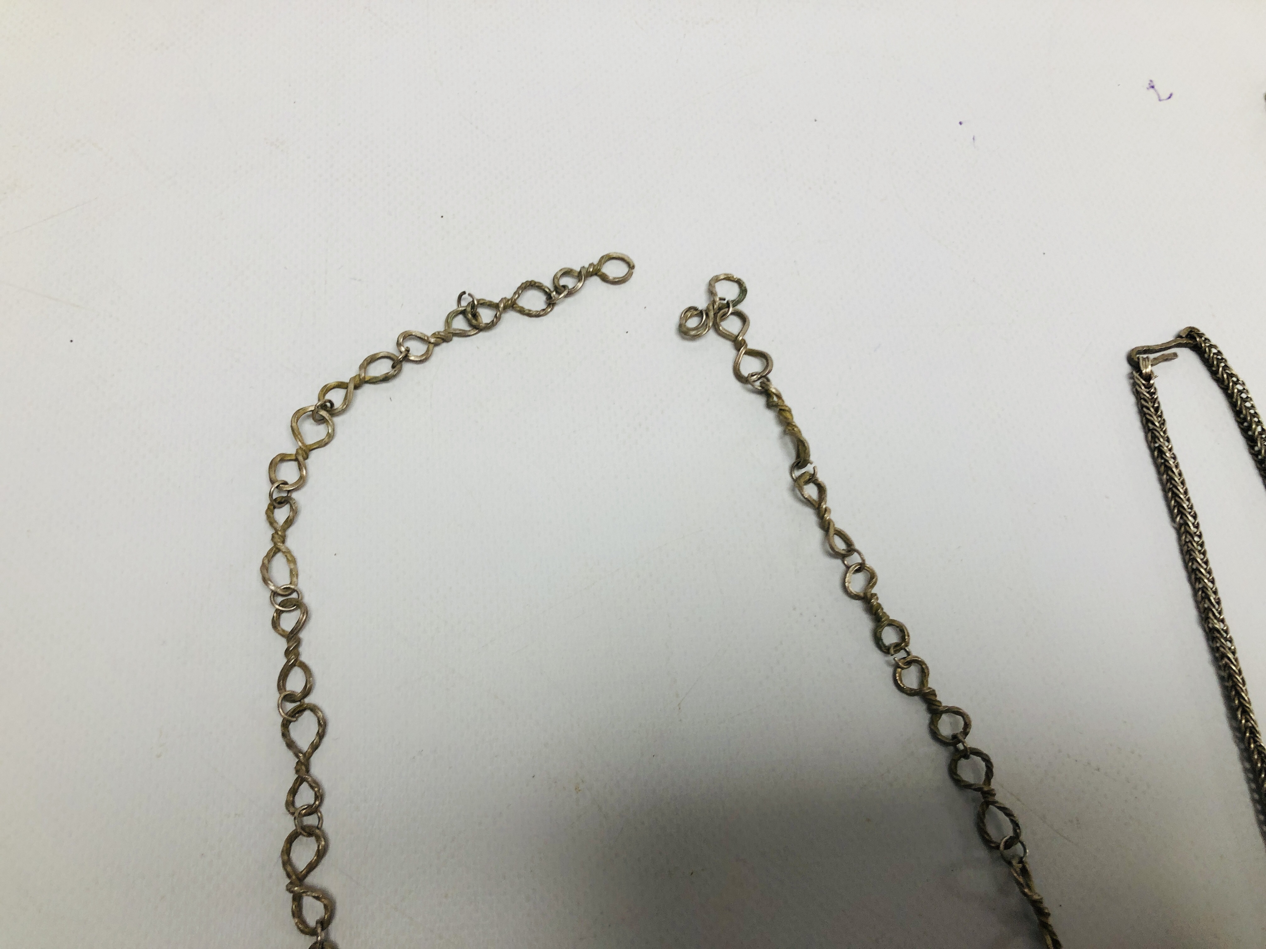 A GROUP OF 4 EASTERN STYLE WHITE METAL NECKLACES. - Image 8 of 15